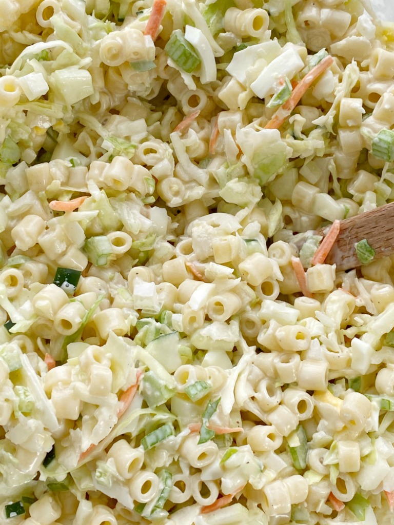 Coleslaw Pasta Salad | Pasta Salad | Side Dish | Coleslaw pasta salad is a fun twist to traditional pasta salad. Loaded with texture, taste, and fabulous crunch. This is the perfect side dish for a summer bbq, picnic, or potluck! It can be made ahead of time too. #pastasalad #sidedish #saladrecipes #bbq #pastasaladrecipes