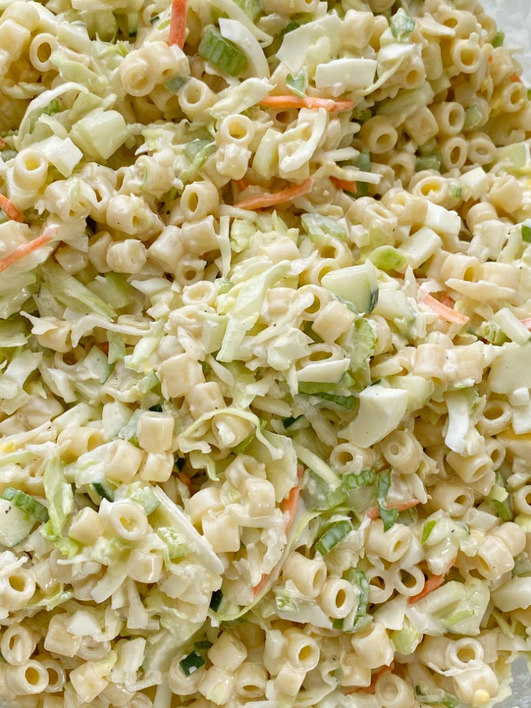 Coleslaw Pasta Salad | Pasta Salad | Side Dish | Coleslaw pasta salad is a fun twist to traditional pasta salad. Loaded with texture, taste, and fabulous crunch. This is the perfect side dish for a summer bbq, picnic, or potluck! It can be made ahead of time too. #pastasalad #sidedish #saladrecipes #bbq #pastasaladrecipes