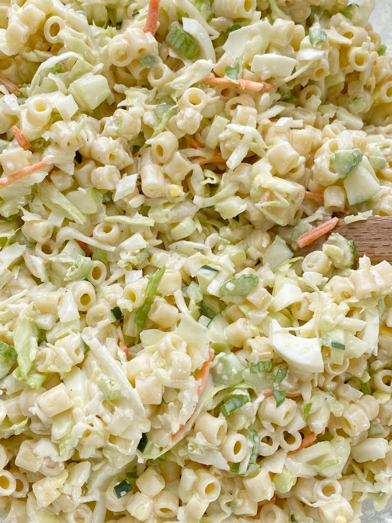 Coleslaw Pasta Salad | Pasta Salad | Side Dish | Coleslaw pasta salad is a fun twist to traditional pasta salad. Loaded with texture, taste, and fabulous crunch. This is the perfect side dish for a summer bbq, picnic, or potluck! It can be made ahead of time too. #pastasalad #sidedish #saladrecipes #bbq #pastasaladrecipes