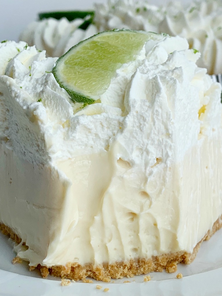 No Bake Key Lime Pie | Key Lime Pie | No Bake Desserts | Quick & easy Key Lime Pie is so easy to make and no baking required! A creamy, smooth, and sweet key lime cheesecake filling inside a prepared graham cracker crust. Garnish with key lime whipped cream for the best no bake dessert. #recipeoftheday #nobake #nobakedesserts #easydesserts #dessertideas #easterrecipes #keylimepie
