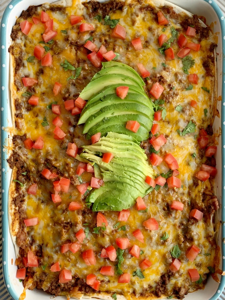 Burrito Lasagna | Lasagna Recipe | Casseroles | Burrito Lasagna is a tried & true family favorite! This ground beef burrito lasagna is simple to make with minimal ingredients. Layers of seasoned ground beef, Spanish rice, cheese, refried beans, and lots of cheese. #lasagna #dinnerrecipes #recipeoftheday #groundbeefrecipes 
