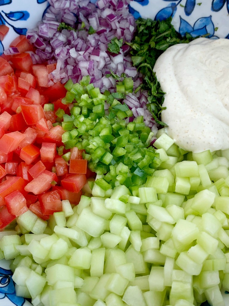 Cucumber Salsa | Healthy Recipe | Salsa Recipes | Cucumber salsa is full of fresh cucumber, tomatoes, cilantro, red onion, jalapeño, and a light & creamy seasoned dressing. Serve with chips, as a side dish, or on top of grilled meat for a deliciously light summertime recipe. #appetizerrecipes #salsas #dips #recipeoftheday #healthyrecipes #summerrecipes