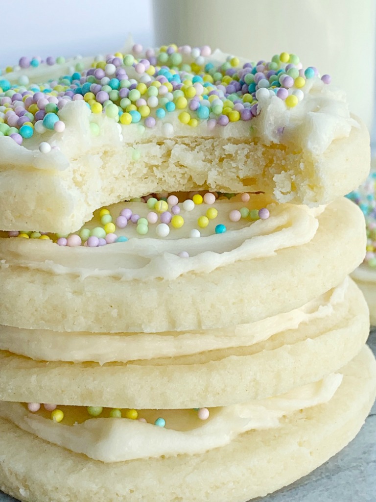 Perfect Sugar Cookies | Sugar Cookie Recipe | This is the only sugar cookie recipe you'll need! Perfectly soft-baked, thick, chewy, and so creamy thanks to the surprise ingredient - cream cheese! Topped with a sweet & simple powdered sugar frosting. Change up the sprinkles for all different Holidays! #sugarcookies #cookierecipes #dessertrecipes #recipeoftheday