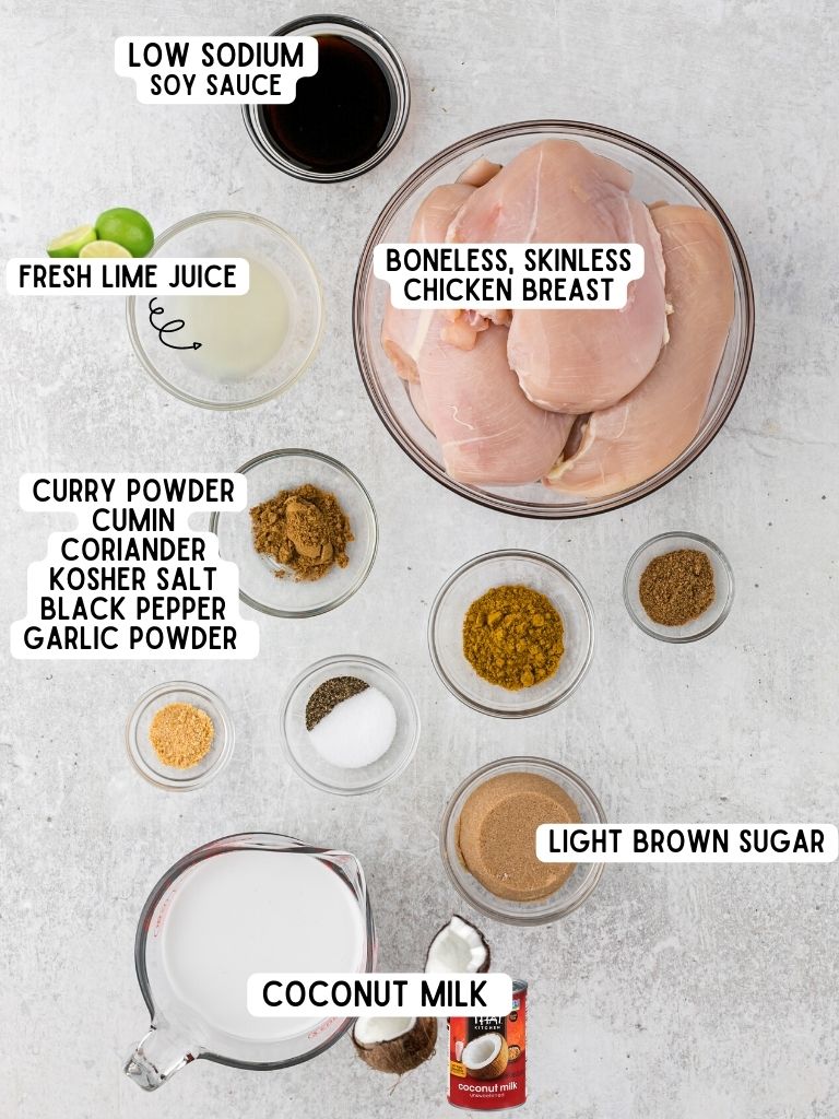 Ingredients needed to make Thai coconut grilled chicken with each ingredient labeled in black text with what it is.