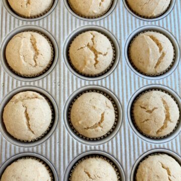 Applesauce Muffins | Muffin Recipe | Applesauce Muffins are so moist, lightly sweet, and easy to make in one bowl with no mixer needed! Sour cream and applesauce makes these muffins so moist, and they bake up perfectly round each and every time. You will love these delicious muffins! #muffins #applesaucemuffins #snackrecipes #muffinrecipes #recipeoftheday