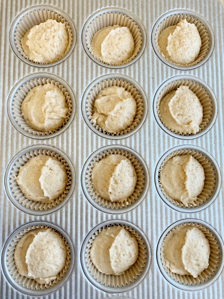 Applesauce Muffins are so moist, lightly sweet, and easy to make in one bowl with no mixer needed! Sour cream and applesauce makes these muffins so moist, and they bake up perfectly round each and every time. You will love these delicious muffins!