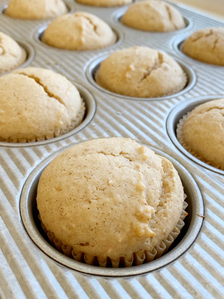 Applesauce Muffins are so moist, lightly sweet, and easy to make in one bowl with no mixer needed! Sour cream and applesauce makes these muffins so moist, and they bake up perfectly round each and every time. You will love these delicious muffins!