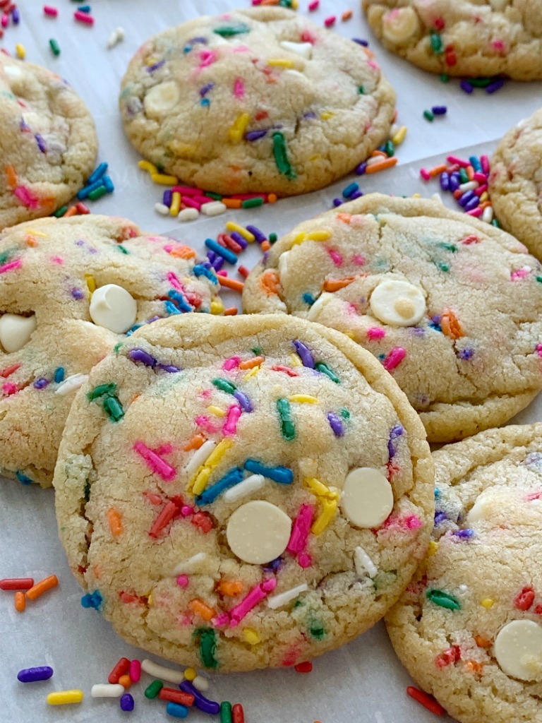 Funfetti Cookies are loaded with white chocolate, funfetti sprinkles, and instant pudding mix which makes them so thick, chewy, buttery, and soft-baked! These funfetti cookies will stay soft for days! #cookierecipe #cookies #puddingcookies #dessertrecipe #easyrecipe #recipeoftheday