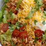 Ground Turkey Taco Salad Bowls | Taco Salad Bowls | Ground Turkey Recipes | Healthy Ground Turkey Taco Salad Bowls are made in one pot on the stovetop! Just like a taco salad with fresh green lettuce, topped with a flavorful & healthy ground turkey and brown rice mixture, and loaded with all your favorite taco toppings. #healthyrecipe #healthydinnerrecipes #groundturkeyrecipes #groundturkey #healthy #dinner #dinnerrecipe #recipeoftheday