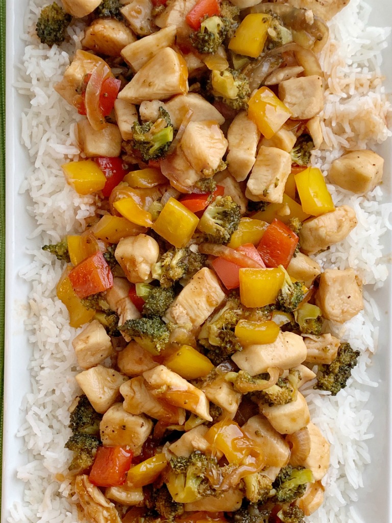 20 Minute, One Pan Stir-Fry Recipe | This family favorite Stir-Fry Recipe only needs one pan and 20 minutes! Chunks of tender chicken, fresh veggies in a deliciously unique (and easy!) homemade stir-fry sauce. Serve over rice for a family favorite dinner. #dinnerideas #dinnerrecipe #stirfry #onepot #onepanrecipe #recipeoftheday