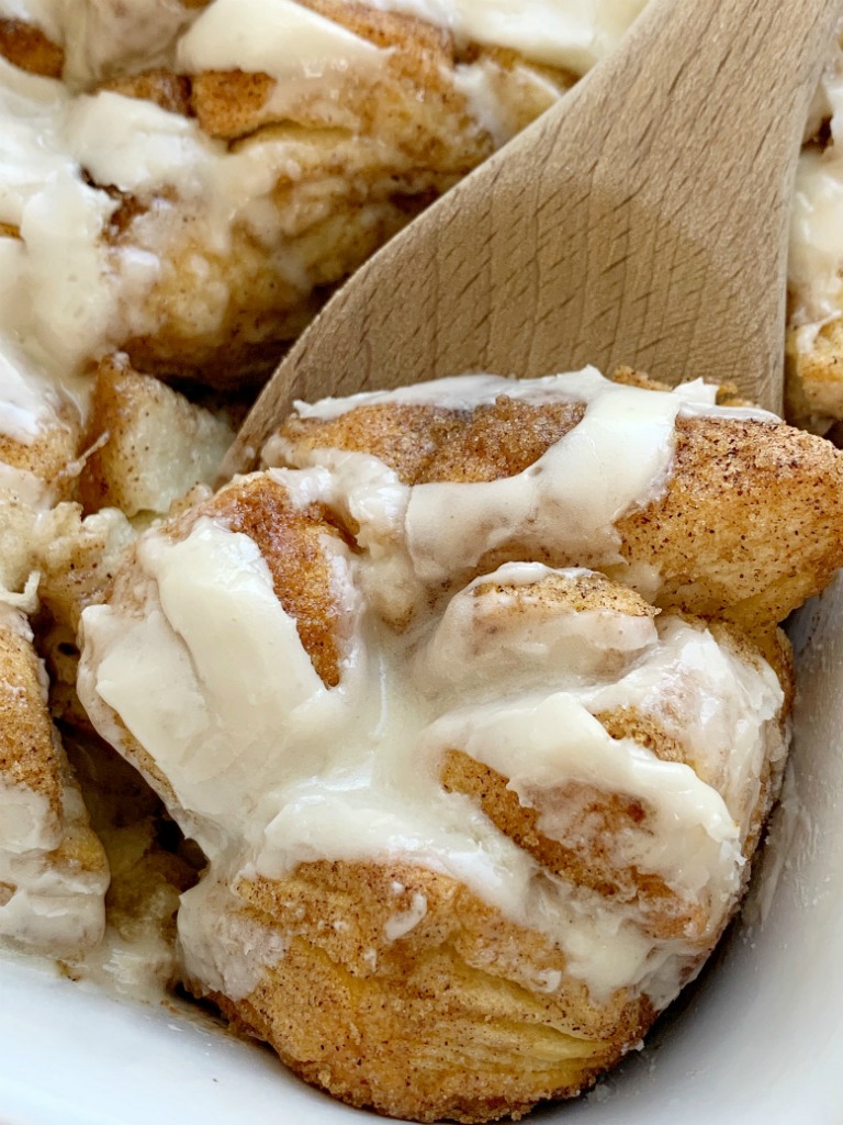 Cinnamon Roll Casserole is so easy and simple to make! Biscuits covered in cinnamon, sugar, and butter. Little cinnamon roll bites in an easy to make breakfast casserole. 