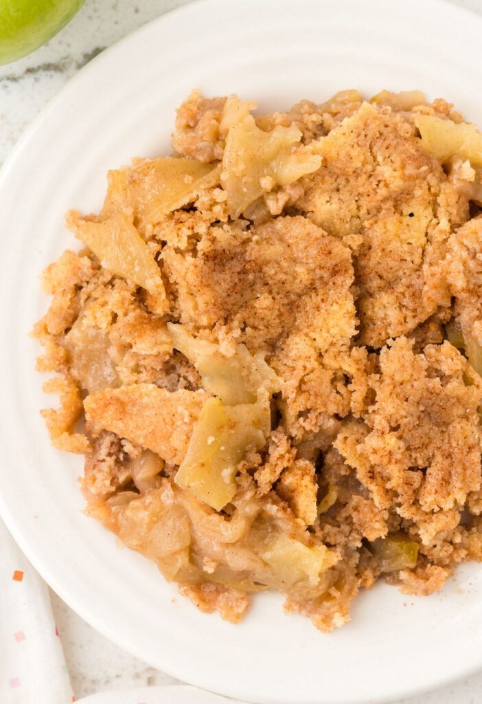 hero shot of the apple cobbler on a white plate