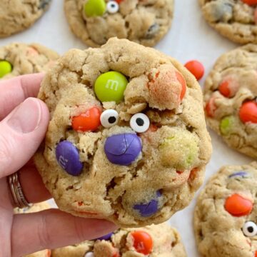 Halloween Recipe | Monster Cookies | Halloween Monster Cookies are chewy, soft-baked, and loaded with peanut butter, oats, Halloween m&m candies, and spooky candy eyeballs. These Halloween cookies are a fun and delicious way to celebrate Halloween!