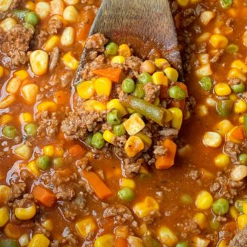 Vegetable Beef Soup only needs one pot and 30 minutes on the stove. Ground beef, frozen vegetables, tomato sauce, beef broth, and a couple surprise ingredients make this vegetable beef soup so delicious & easy to make!