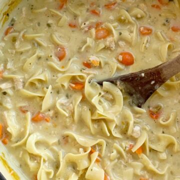 Creamy Chicken Noodle Soup is a creamy version of the classic comfort food chicken noodle soup. Chicken, carrots, onion, egg noodles in a creamy and flavorful seasoned chicken broth base.