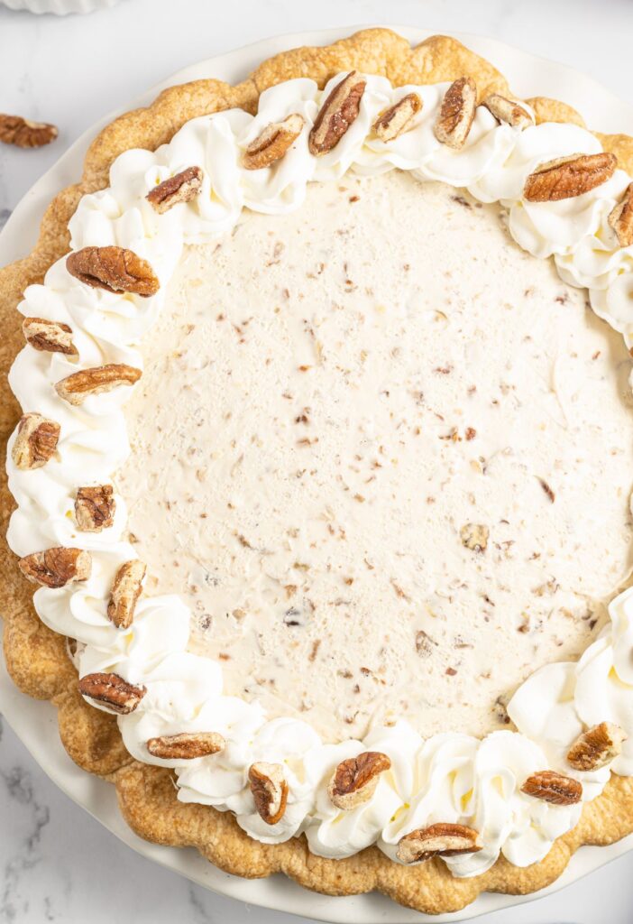 overhead of the whole pie with pecans