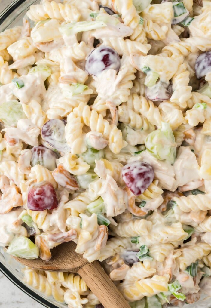 A close up pic of the chicken pasta salad with cashews and fruit
