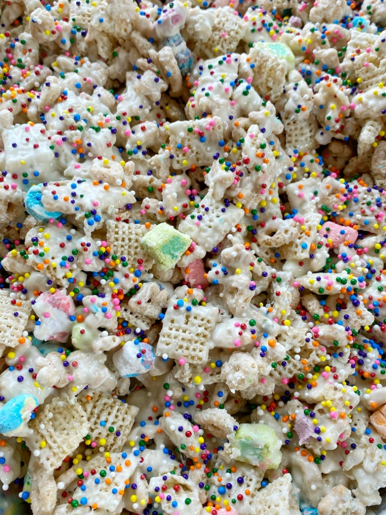 Lucky Charms Rainbow Snack Mix is a sweet and crunchy snack mix of lucky charms cereal, rice chex cereal, white chocolate chips, and rainbow sprinkles! Only 5 ingredients for this easy and delicious lucky charms snack mix.