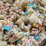 Lucky Charms Rainbow Snack Mix is a sweet and crunchy snack mix of lucky charms cereal, rice chex cereal, white chocolate chips, and rainbow sprinkles! Only 5 ingredients for this easy and delicious lucky charms snack mix.