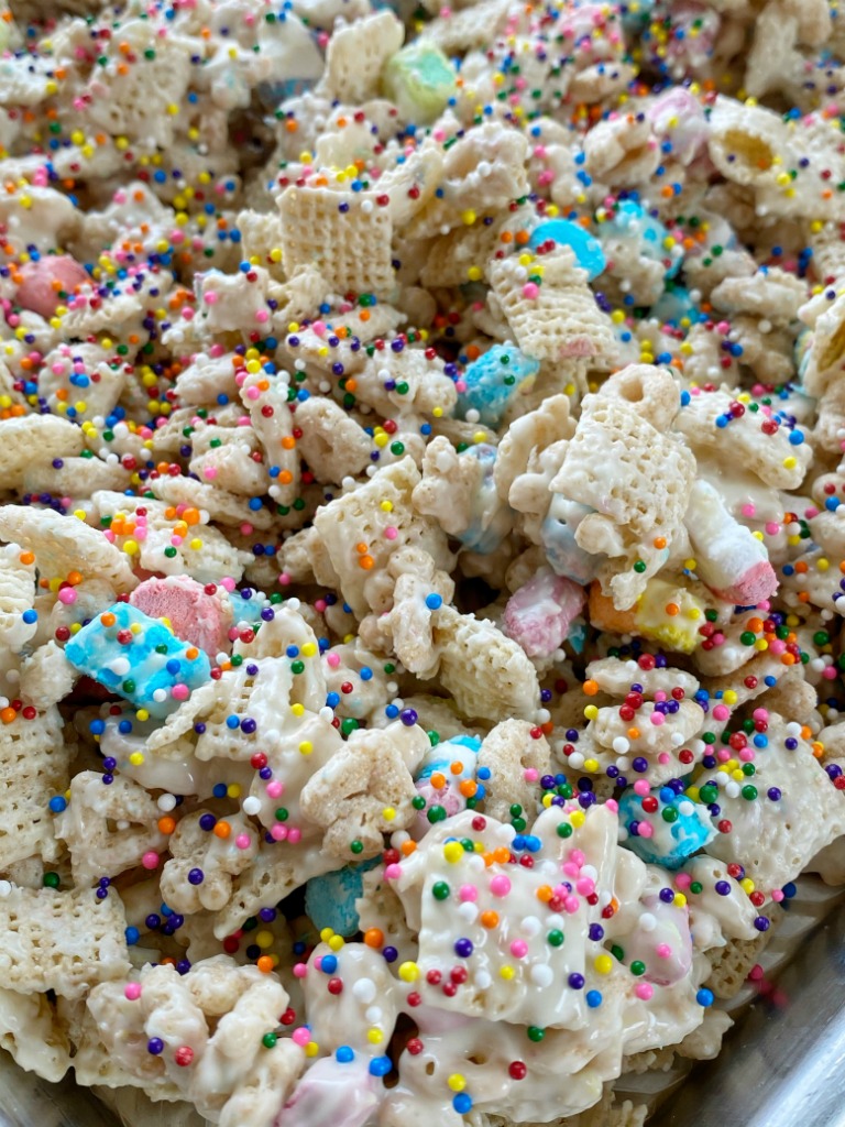 Lucky Charms Rainbow Snack Mix is a sweet and crunchy snack mix of lucky charms cereal, rice chex cereal, white chocolate chips, and rainbow sprinkles! Only 5 ingredients for this easy and delicious lucky charms snack mix.