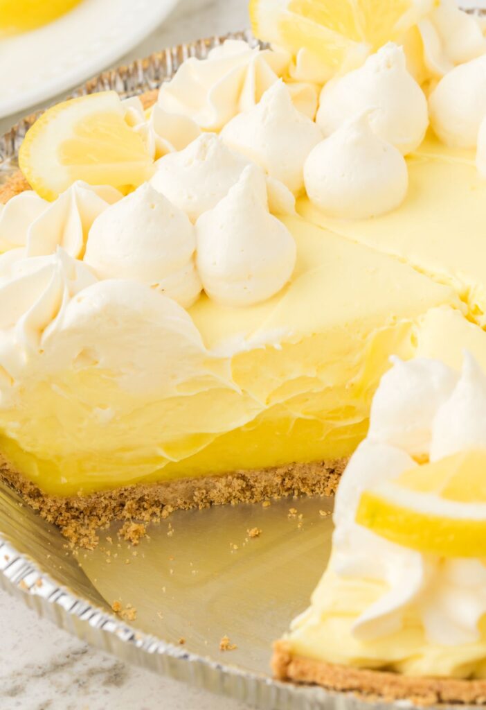 Side view of the cheesecake being cut into slices.