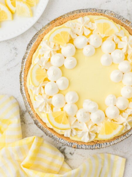 Top view of the no bake lemon pie inside a store bought graham cracker crust.