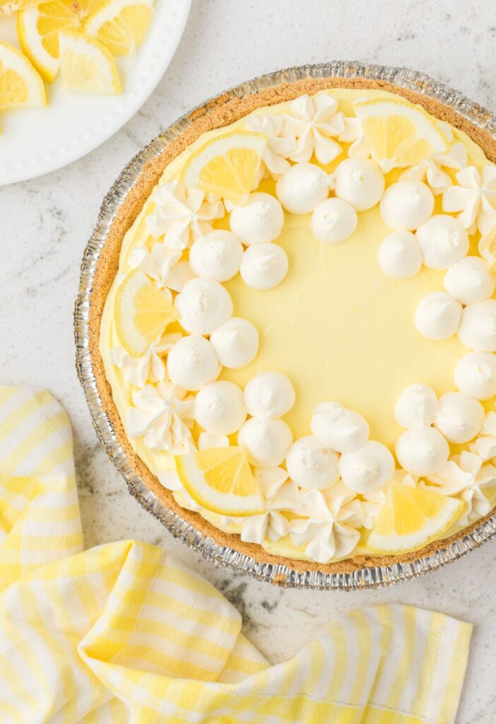 Top view of the no bake lemon pie inside a store bought graham cracker crust.