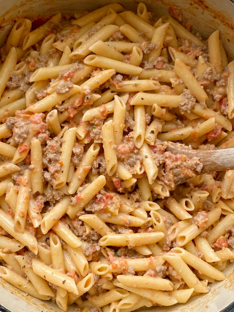 Creamy Tomato Beef Pasta is a 30 minute dinner recipe that the entire family will love! Pasta noodles covered in a creamy tomato ground beef meat sauce. Simple and easy to make.