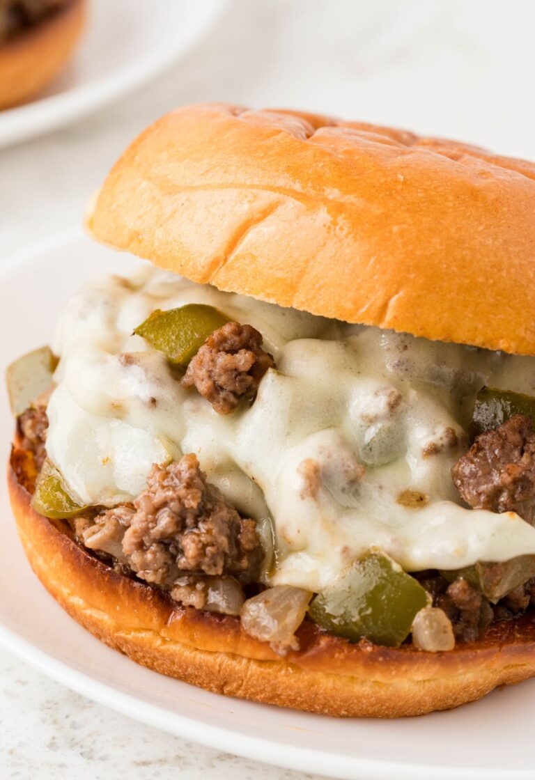 A sloppy Joe with meat filling and melted cheese.