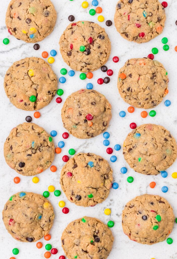 Cookies with m&m candies around them on a white background
