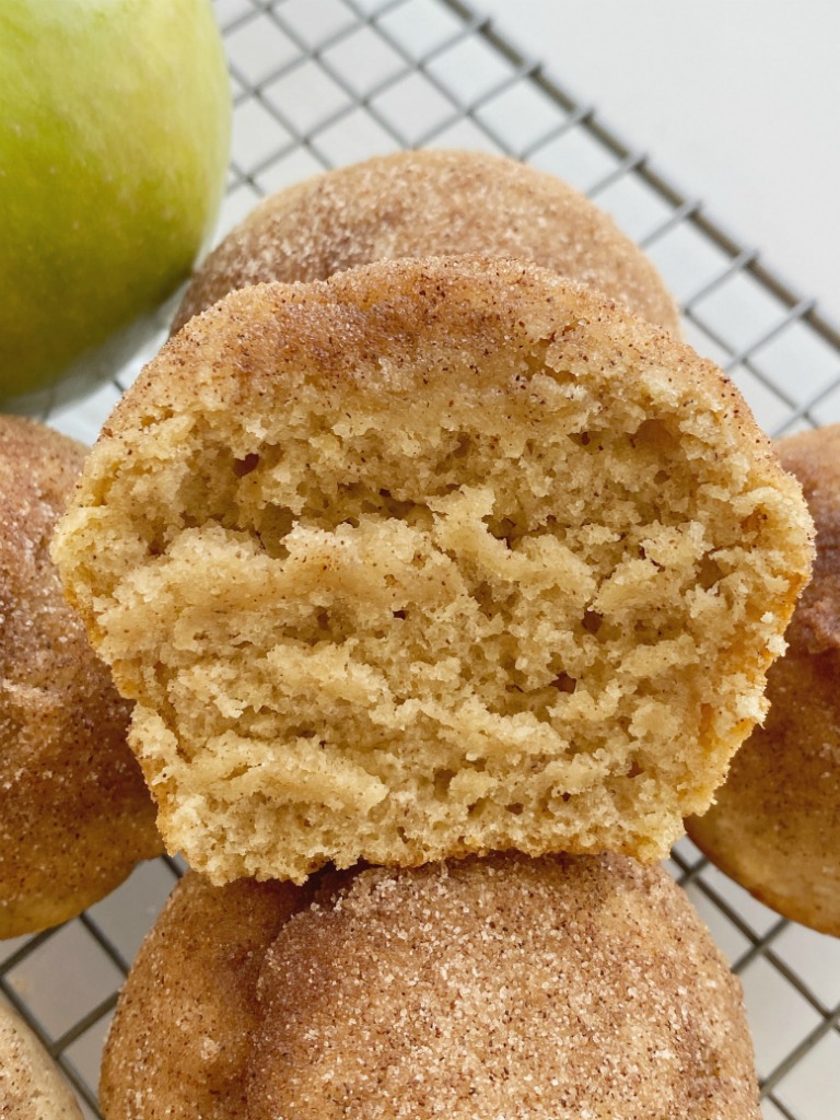 Cinnamon Applesauce Muffins are so fluffy & soft! Made with cinnamon applesauce, warm cinnamon, and topped with a buttery cinnamon & sugar topping. These muffins always disappear fast. 