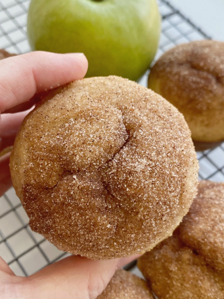 Cinnamon Applesauce Muffins are so fluffy & soft! Made with cinnamon applesauce, warm cinnamon, and topped with a buttery cinnamon & sugar topping. These muffins always disappear fast. 