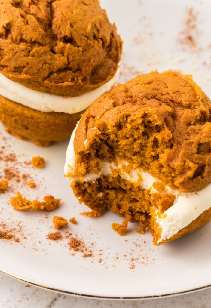 A whoopie pie with a bite taken out of it