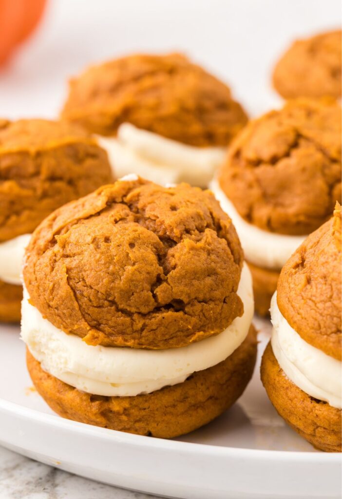 Hero shot for pumpkin whoopie pies with a cheesecake filling.