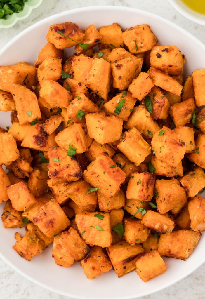 Top view of the sweet potatoes on a white plate