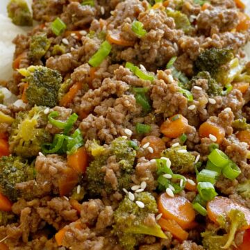 Ground Beef Teriyaki is an easy ground beef dinner recipe that simmers in a homemade teriyaki sauce, broccoli, and carrots. Serve over rice for delicious teriyaki rice bowls.