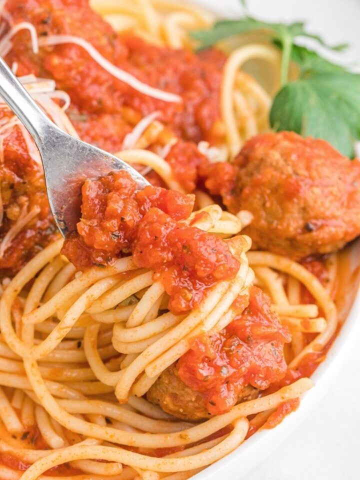 Slow Cooker Spaghetti and Meatballs Together as Family