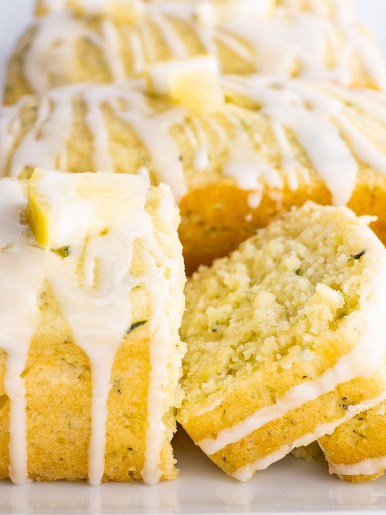 A picture of lemon zucchini bread topped with glaze. 