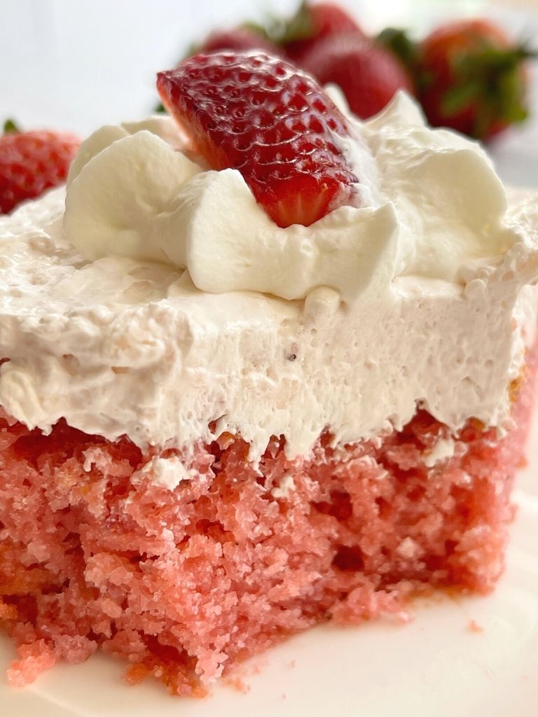 A slice of easy strawberry cake on a plate.
