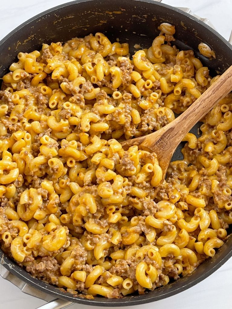 Recipe for homemade hamburger helper that is shown inside a skillet pan.