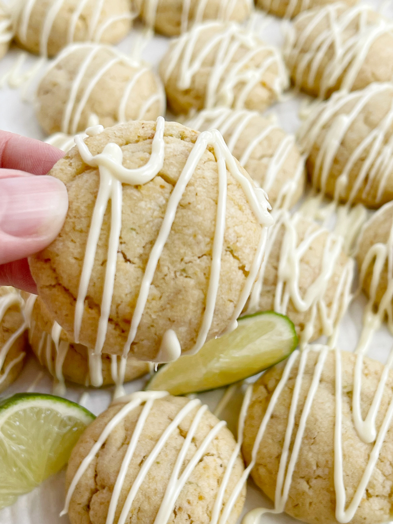 A picture of a key lime pie cookie with white chocolate glaze. 