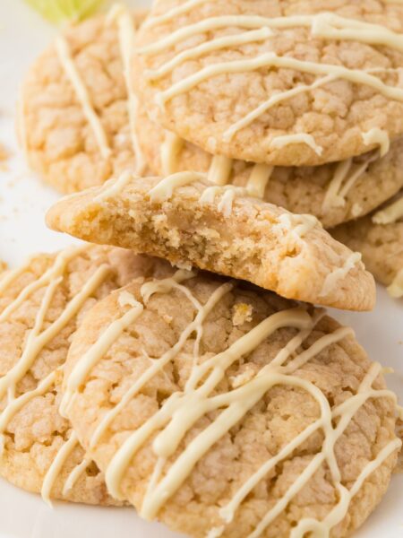 A stack of key lime cookies with a white chocolate glaze