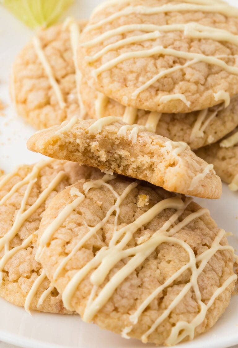 A stack of key lime cookies with a white chocolate glaze