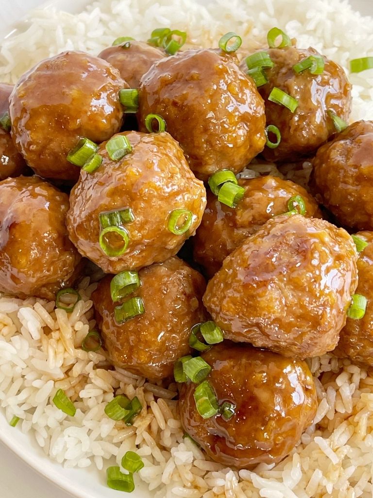 Plate of meatballs with teriyaki sauce.