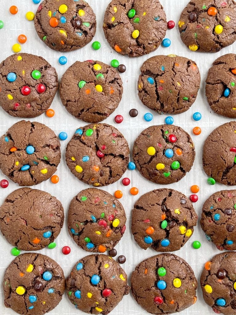 Overhead shot of a cookie tray of chocolate m&m cookies.