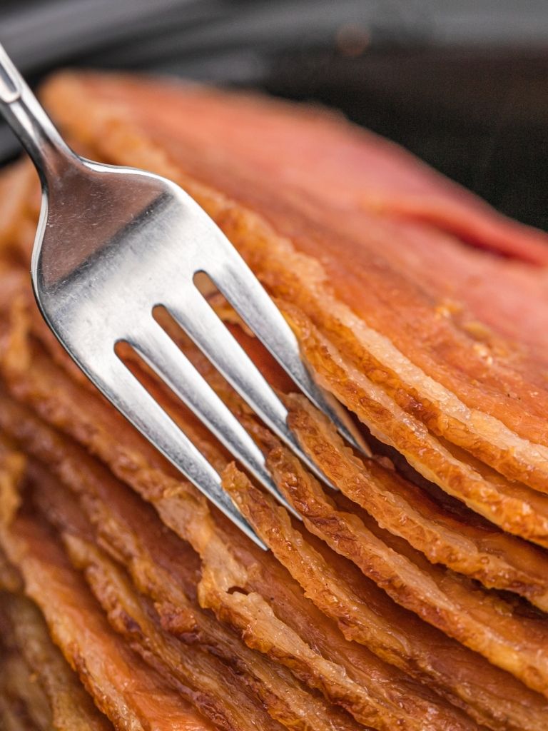 Fork inside a spiral cut ham.