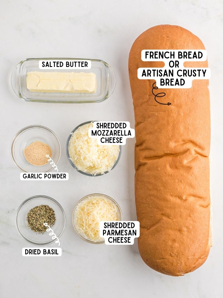Ingredients needed to make this garlic bread recipe with cheese. Each ingredient is labeled in text with what it is. 