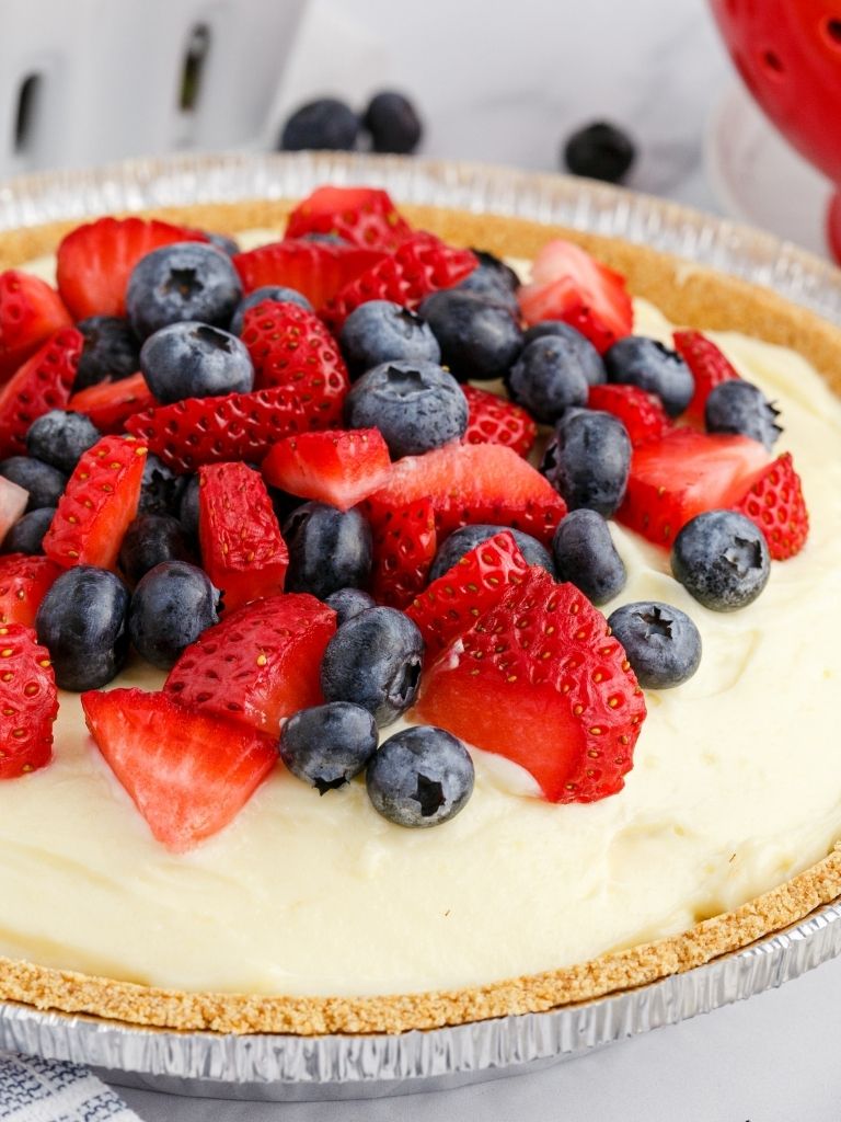 Berries cream pie with a pudding and cream cheese filling.
