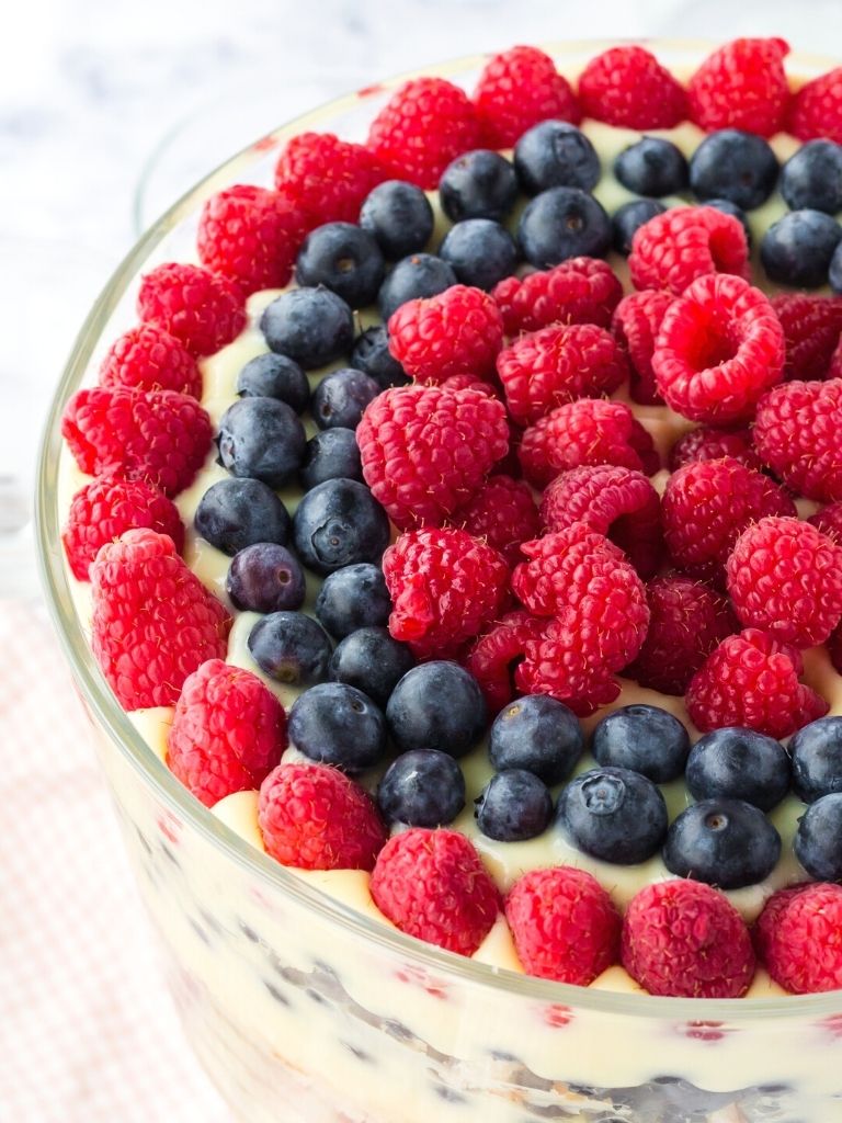A view of the top of the trifle with fresh berries layered.
