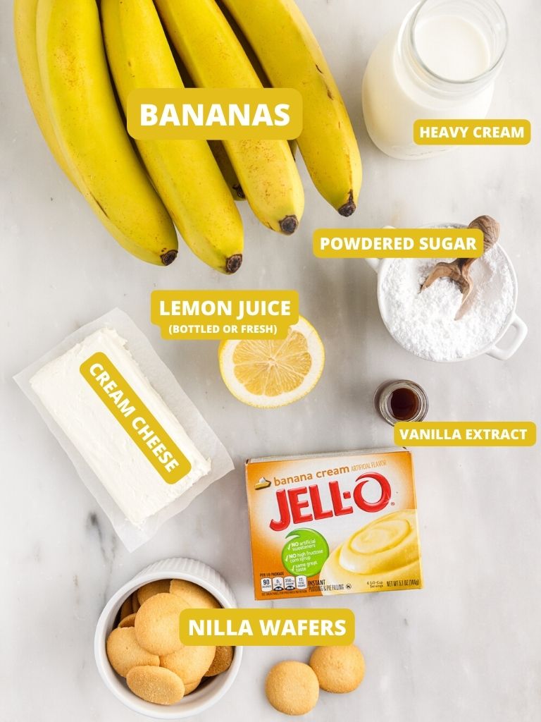 Ingredients needed for this parfait recipe with banana pudding and whipped cream. Each ingredients is labeled in text with what it is. 